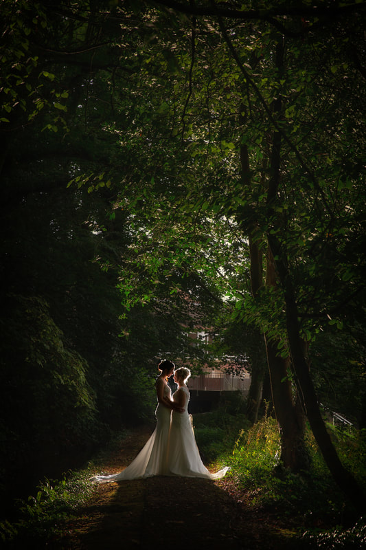 same sex wedding Dunadry Hotel and gardens belfast by stuart macrory photography and film